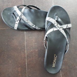 Black and white Vionic sandals